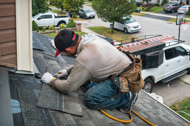 Professional Hail Damage Roof Repair technician working in Gilbert, PA
